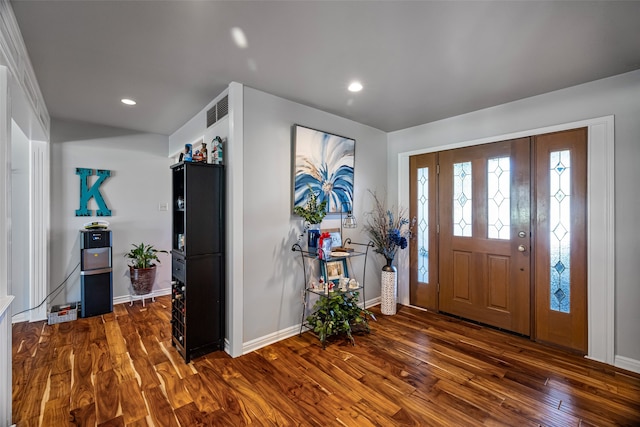 entrance foyer featuring dark hardwood / wood-style floors