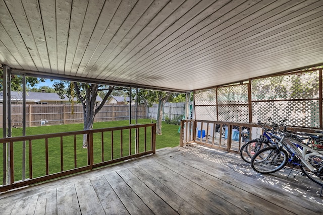 unfurnished sunroom with wooden ceiling