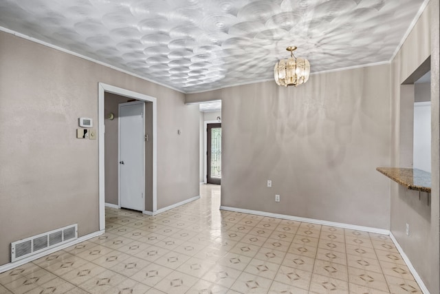 unfurnished room featuring ornamental molding