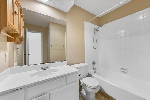 full bathroom with vanity, toilet, shower / bath combination, a textured ceiling, and tile patterned flooring