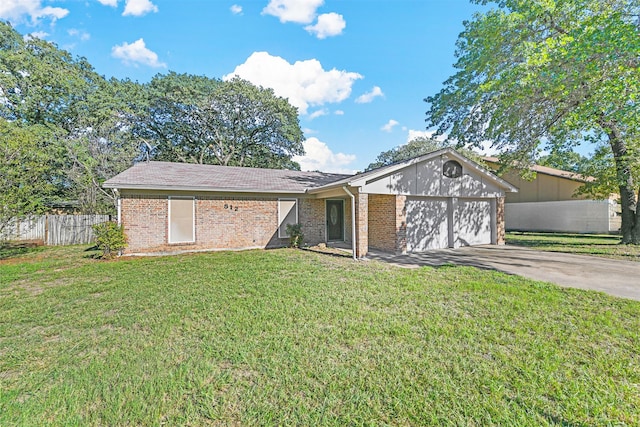 ranch-style home with a front yard and a garage