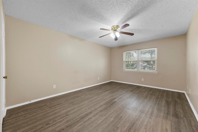 unfurnished room with ceiling fan, a textured ceiling, and dark hardwood / wood-style floors