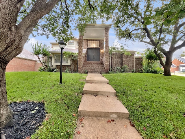 view of front of home with a front lawn