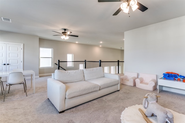 living area featuring visible vents, a ceiling fan, recessed lighting, carpet, and baseboards