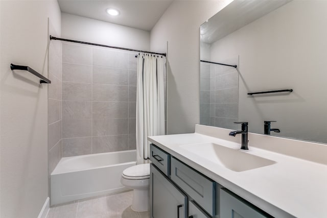 bathroom featuring vanity, shower / bath combination with curtain, toilet, and tile patterned floors