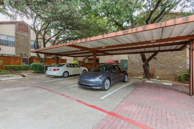 view of vehicle parking featuring a carport