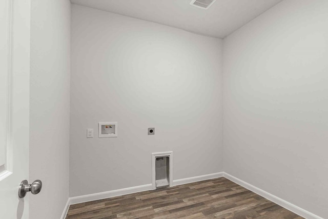 clothes washing area featuring washer hookup, dark wood-type flooring, and hookup for an electric dryer