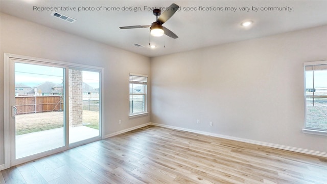 unfurnished room with ceiling fan and light hardwood / wood-style floors