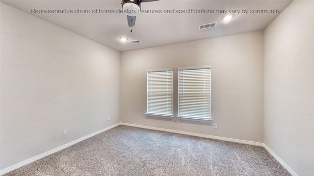 empty room featuring carpet and ceiling fan