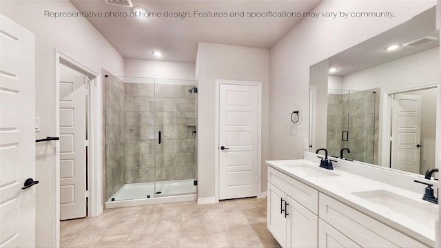 bathroom featuring tile patterned flooring, vanity, and an enclosed shower