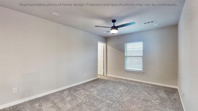 empty room featuring carpet and ceiling fan