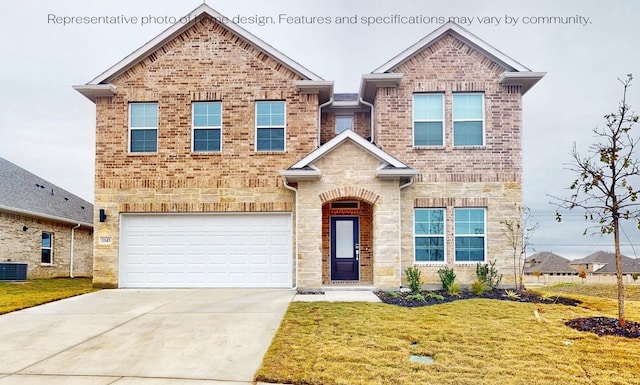 view of front of home with central AC, a front yard, and a garage