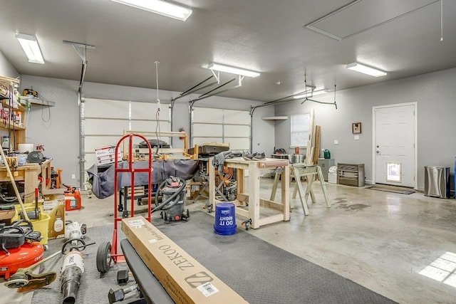 garage featuring a workshop area