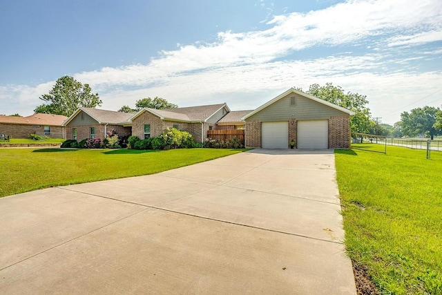 single story home with a front lawn and a garage