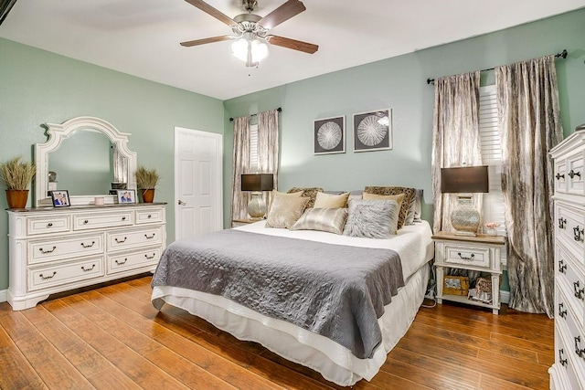 bedroom featuring ceiling fan and hardwood / wood-style floors