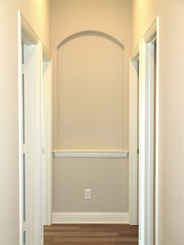 hallway featuring dark hardwood / wood-style floors