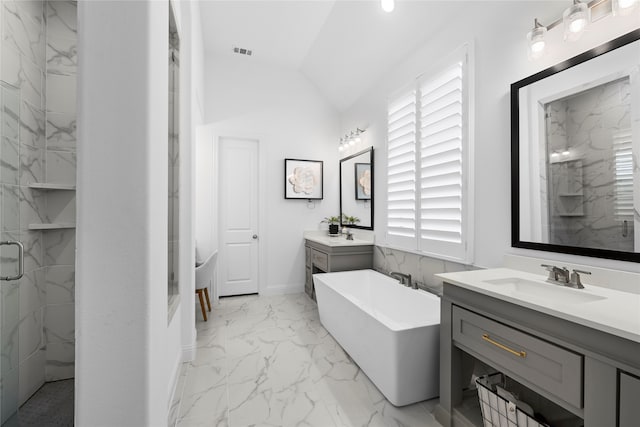 bathroom with vanity, lofted ceiling, and shower with separate bathtub