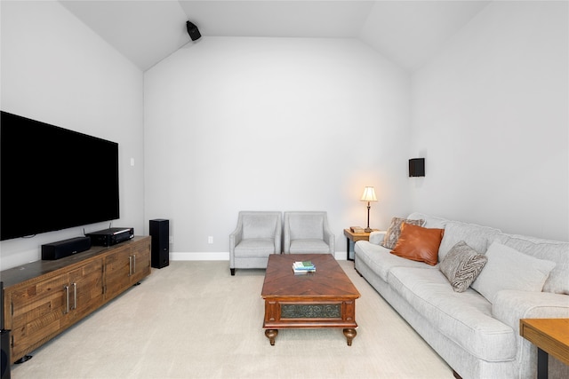 carpeted living room featuring vaulted ceiling