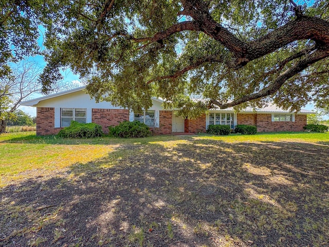 view of front of home with a front yard