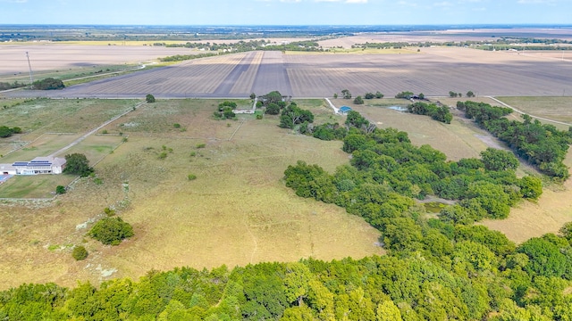 birds eye view of property featuring a rural view