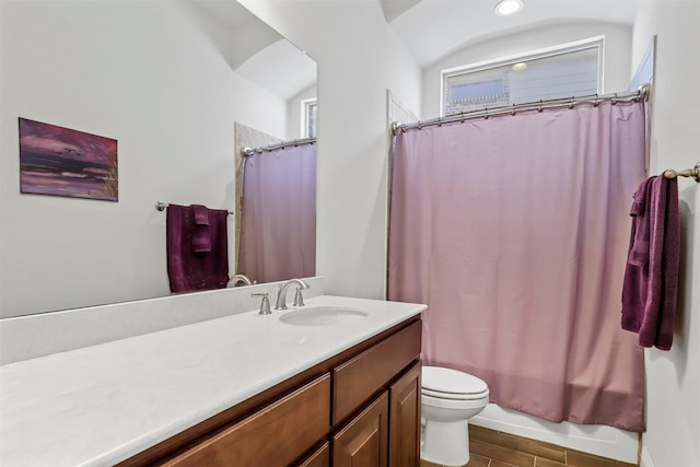 bathroom featuring a shower with shower curtain, wood-type flooring, vanity, and toilet