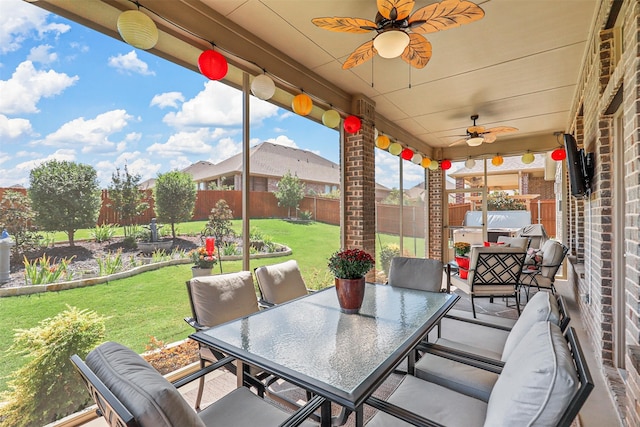 view of patio / terrace featuring ceiling fan