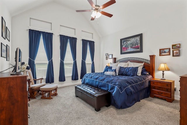 bedroom with high vaulted ceiling, ceiling fan, and carpet flooring