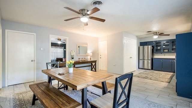 dining area with ceiling fan