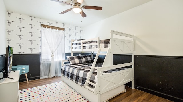 bedroom featuring ceiling fan and hardwood / wood-style floors