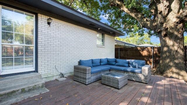 deck with an outdoor living space