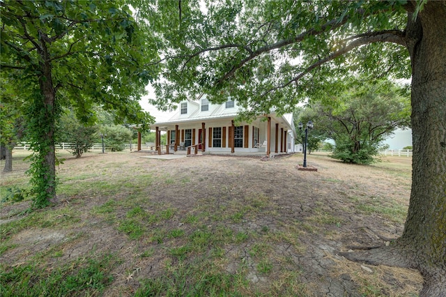 back of house with a porch