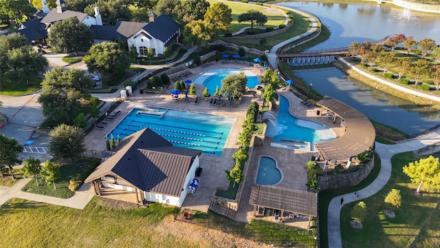 drone / aerial view with a water view