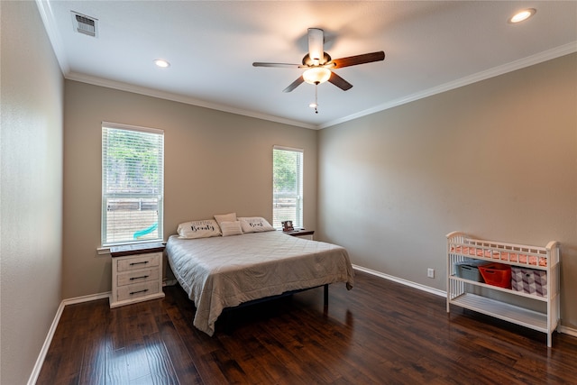 bedroom featuring ceiling fan, dark hardwood / wood-style floors, and crown molding