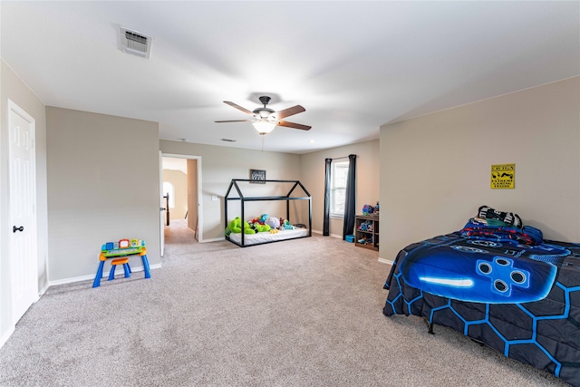 interior space with ceiling fan and carpet floors