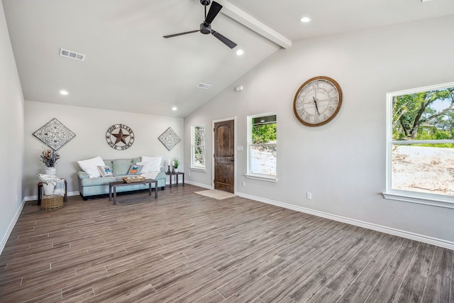 unfurnished room featuring wood-type flooring, ceiling fan, and a wealth of natural light