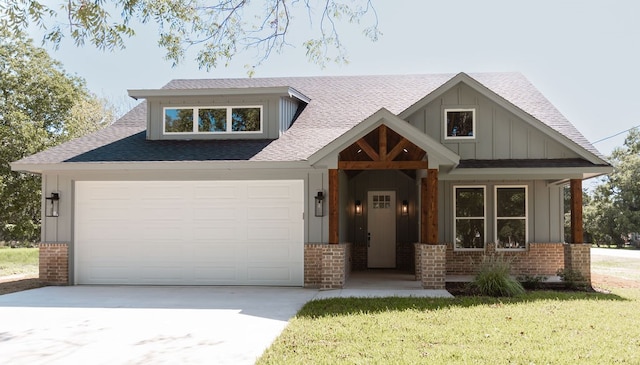 craftsman-style home with a front lawn and a garage