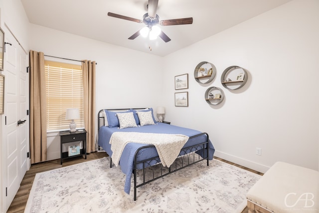 bedroom featuring ceiling fan and hardwood / wood-style floors