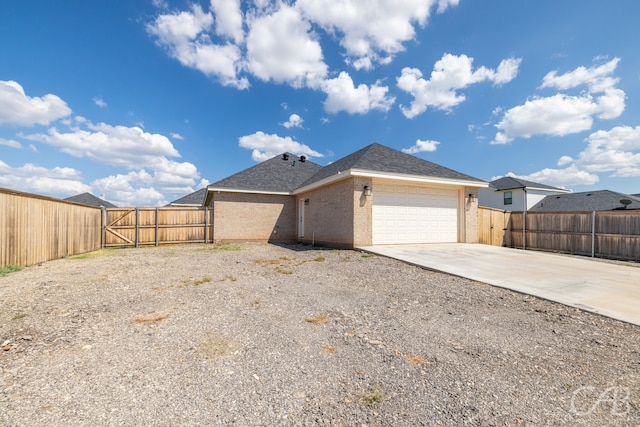 view of side of property featuring a garage