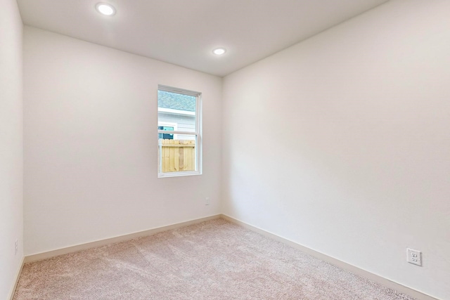 unfurnished room featuring carpet floors