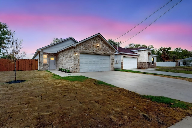 view of front of property with a garage