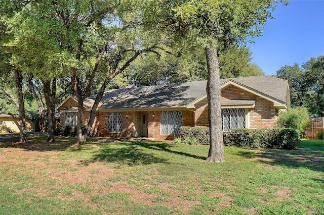 view of front of home with a front lawn