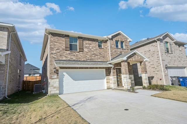 view of front facade featuring a front yard, a garage, and central AC unit