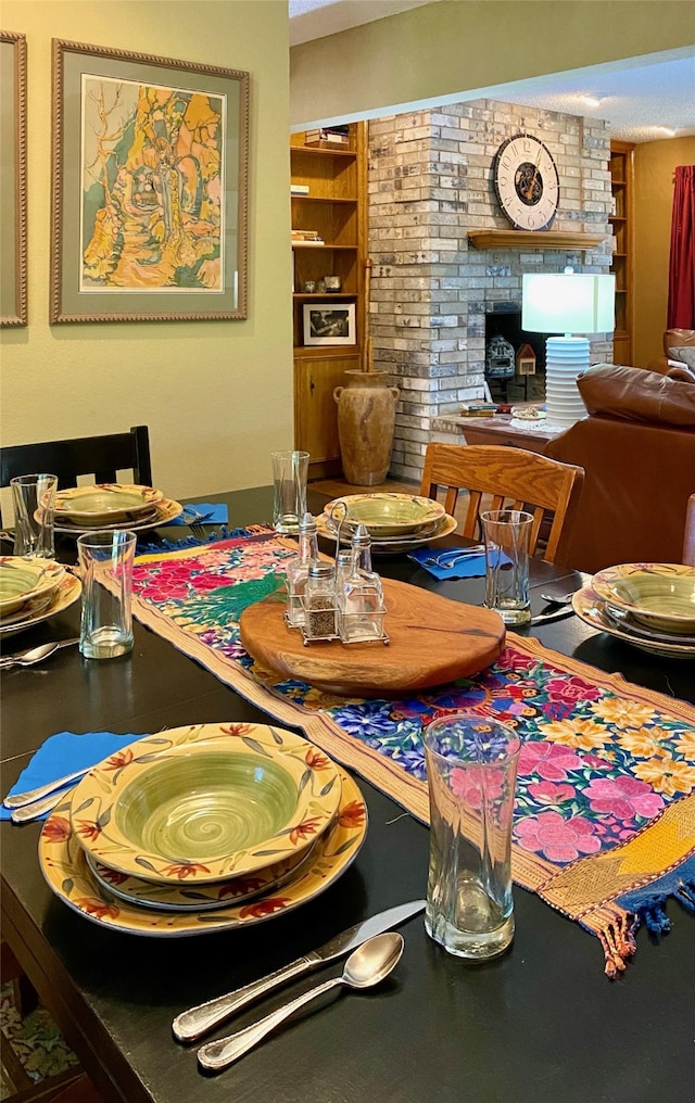 dining space featuring built in shelves