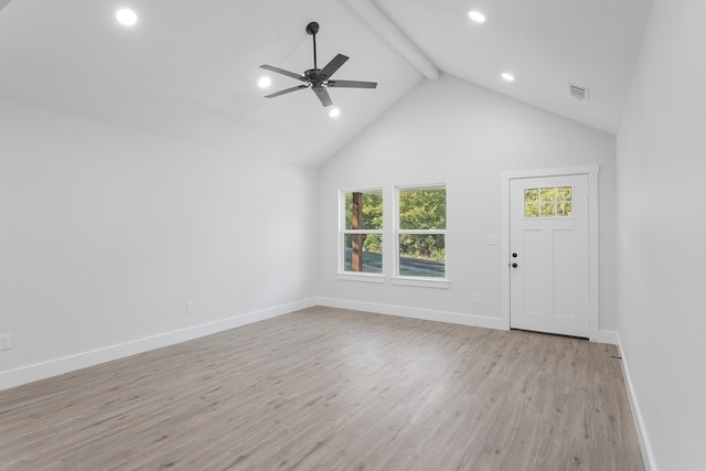 unfurnished living room featuring ceiling fan, beamed ceiling, light hardwood / wood-style floors, and high vaulted ceiling