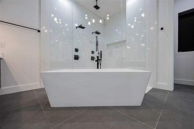 bathroom with tile patterned floors and separate shower and tub