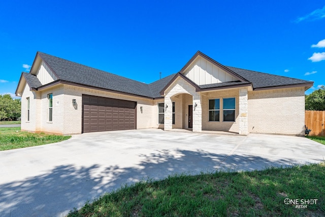 view of front of property with a garage