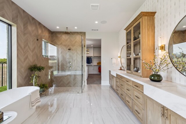 1644 Aster Way, Celina, TX 75009 - bathroom with tiled shower, a freestanding tub, double vanity, marble finish flooring, and recessed lighting