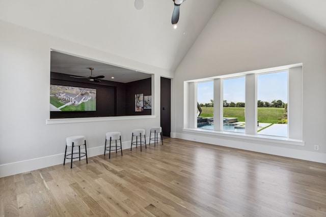 1644 Aster Way, Celina, TX 75009 - living room featuring ceiling fan, high vaulted ceiling, wood finished floors, and baseboards