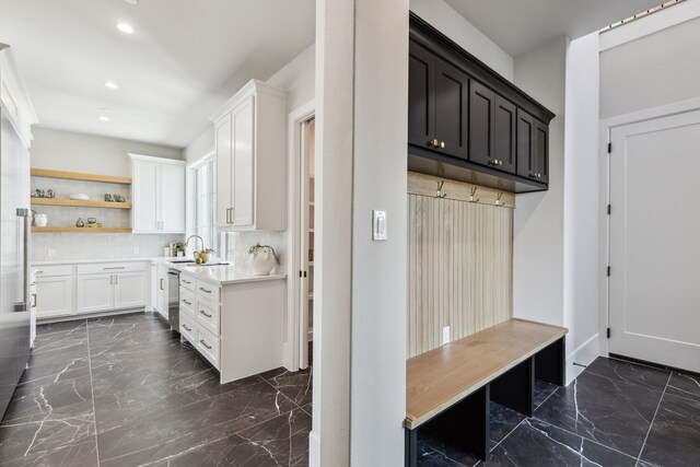 1644 Aster Way, Celina, TX 75009 - mudroom featuring dark marble finish floors, a sink, and recessed lighting