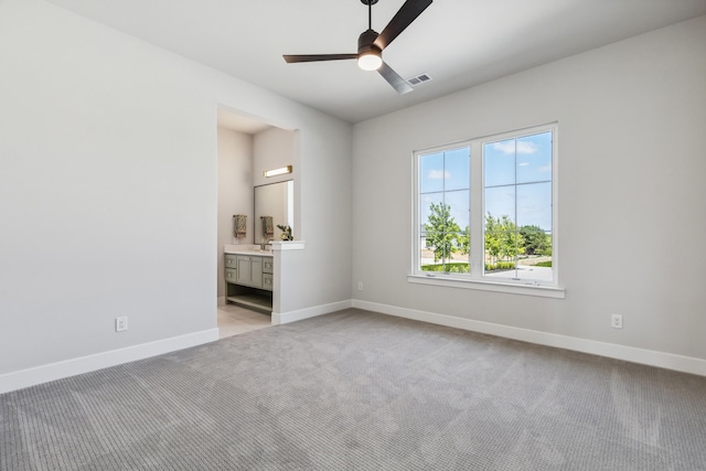 1644 Aster Way, Celina, TX 75009 - empty room with light colored carpet, a ceiling fan, and baseboards